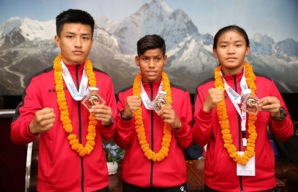तीन पदक लिएर युएईबाट फर्कियो नेपाली बक्सिङ टोली